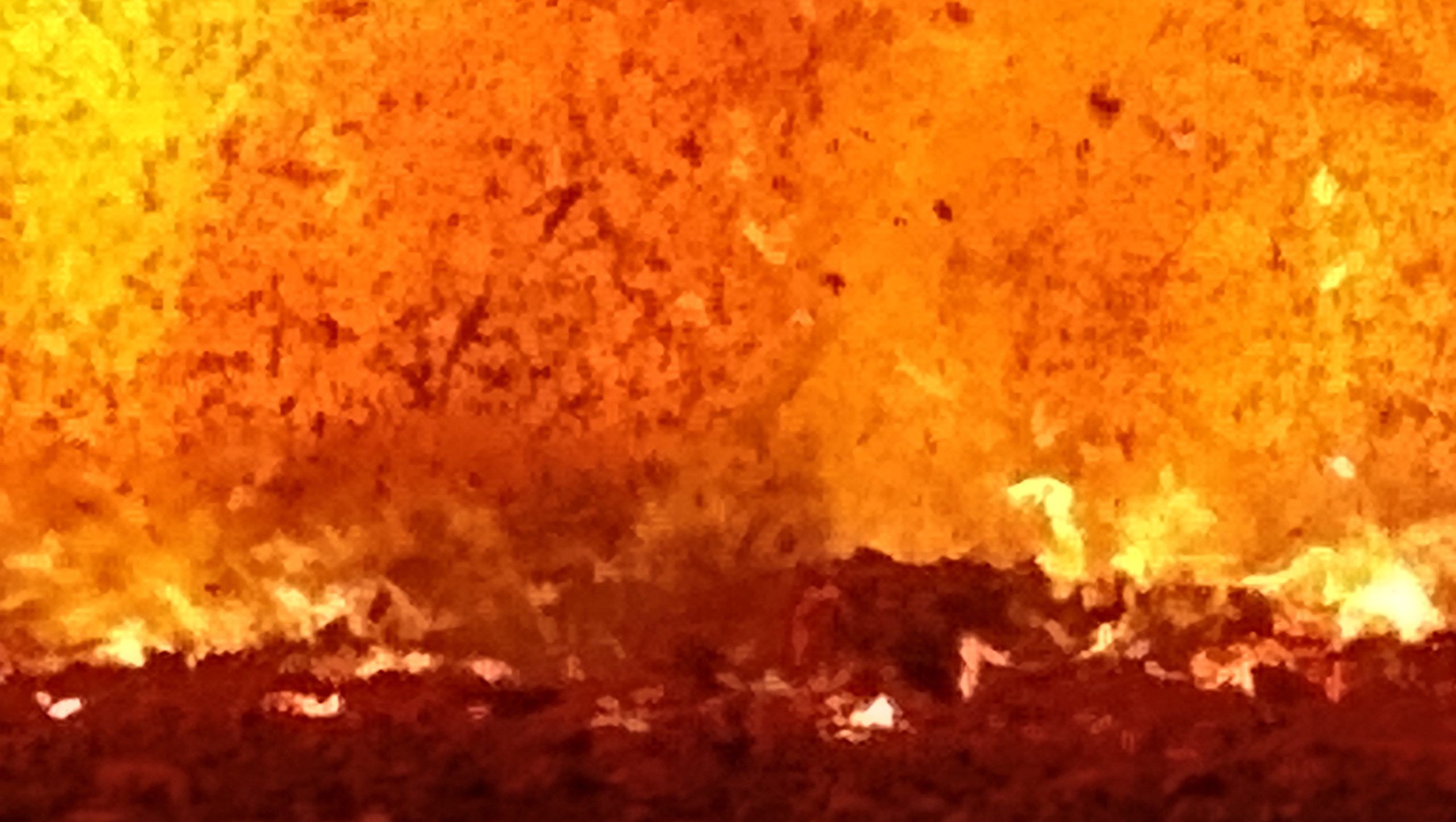 Inside of power boiler, intense flames and airborne burning matter
