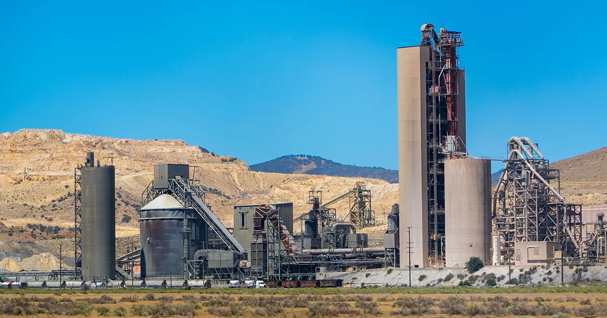 Exterior of a cement plant in Tehachapi, California, an industry monitored by Syn-Fab Inc. cement plant camera systems